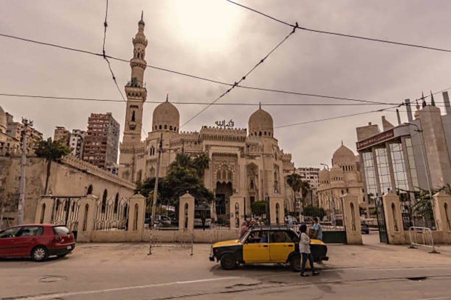 Street scene in front of Sidi Morsi Abu al-Abbas Mosque in Alexandria, Egypt